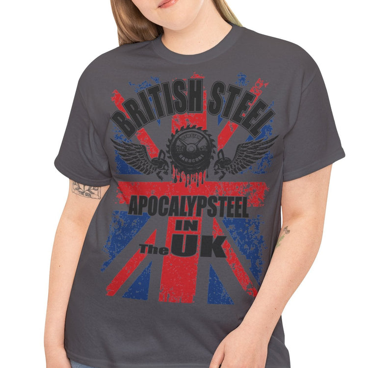 A woman modeling a dark gray graphic t-shirt with a distressed Union Jack design in red and blue, featuring the text 'BRITISH STEEL' and 'APOCALYPSTEEL IN THE UK'.