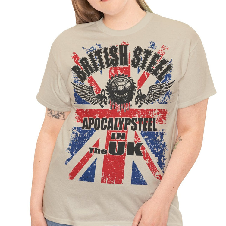 A woman modeling a beige graphic t-shirt with a distressed Union Jack design and the text 'BRITISH STEEL' and 'APOCALYPSTER! IN THE UK'.