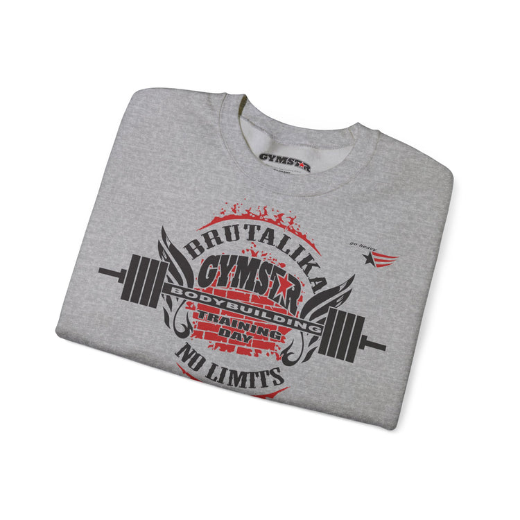 A folded heather gray crewneck sweatshirt with a bold graphic print on the front. The graphic features a barbell design and the words 'BRUTALIKA GYMSEX NO LIMITS' in black and red, with a small logo on the right chest.