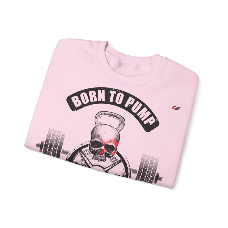 A light pink crewneck sweatshirt with a graphic of a skull lifting a kettlebell and barbell, under a black banner that reads 'BORN TO PUMP'.
