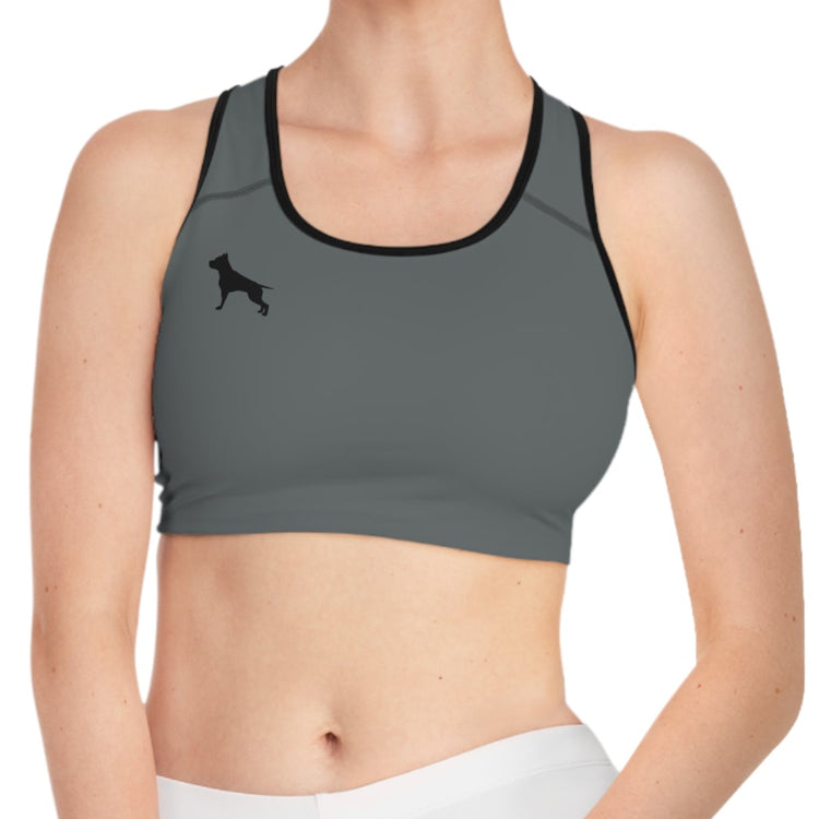 a woman wearing a charcoal-black sports bra fittbull-fitt-wear for crossfit training clothes