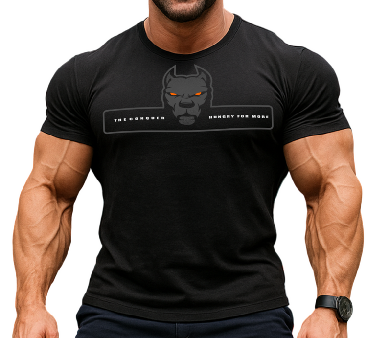 Muscular man in black Fitbull t-shirt and fitness shorts.