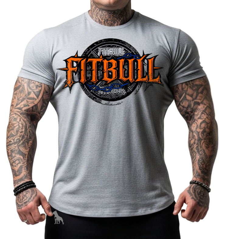 Man wearing a gray bodybuilding motivational 'Fitbull' t-shirt with tattoos on arms.