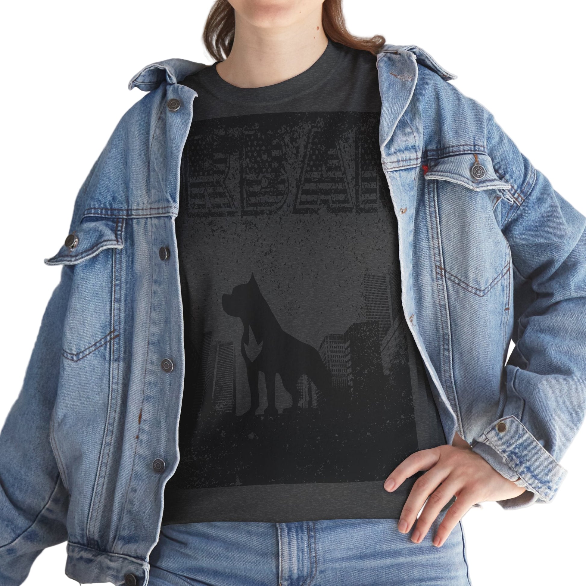 Person wearing a black t-shirt with a dog silhouette design and a denim jacket.