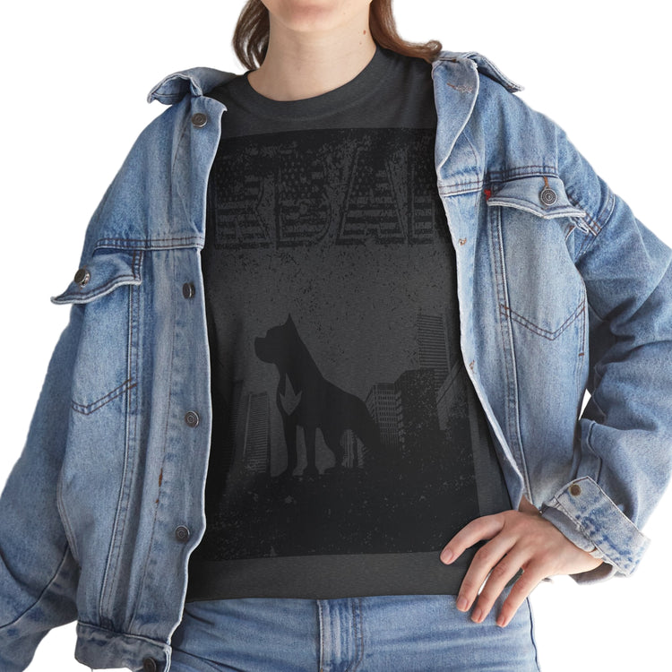 Person wearing a black t-shirt with a dog silhouette design and a denim jacket.