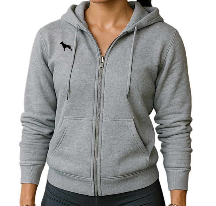Woman in a gym wearing a gray, sport, Fitbull hoodie brandet with a logo.