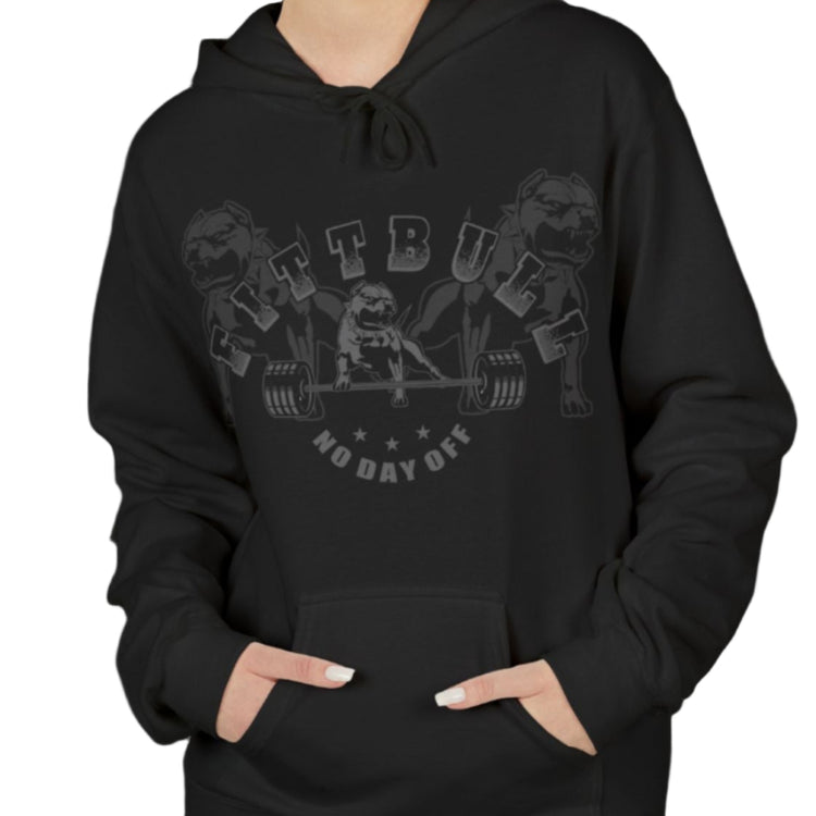 A woman wear sports black hoodet, fitness sweatshirt Fitbull, with motivation desighn No Day Off
front view.