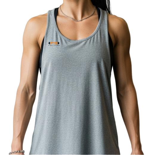 Muscular woman wearing Fitbull Tank Top with brand logo, holding dumbbells in a gym.