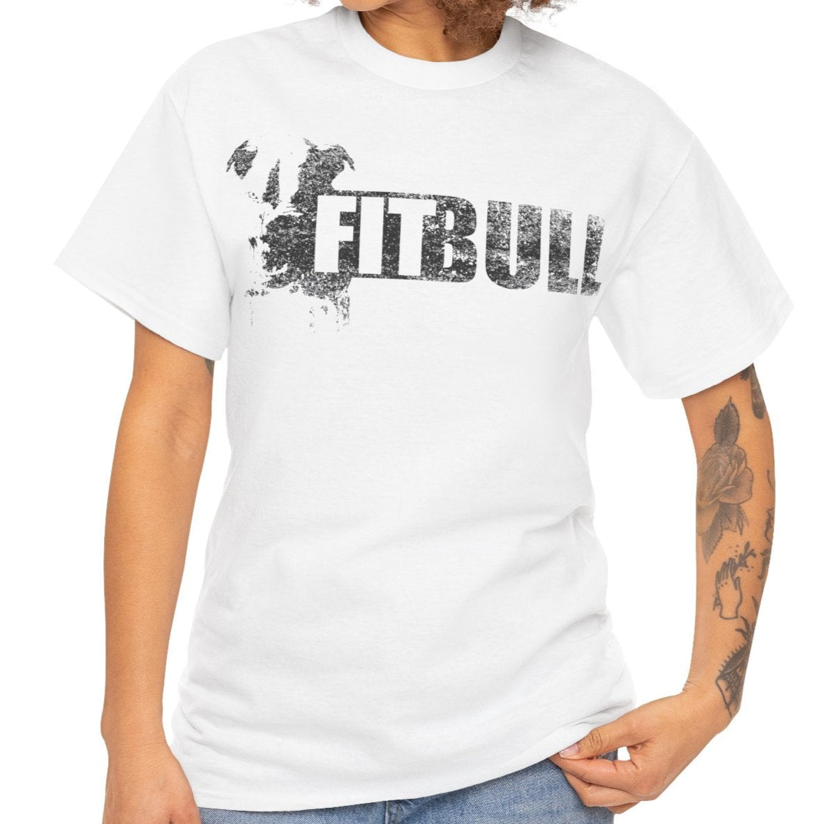 Woman wearing a white fitness t-shirt with 'Fitbull' training motivating design.