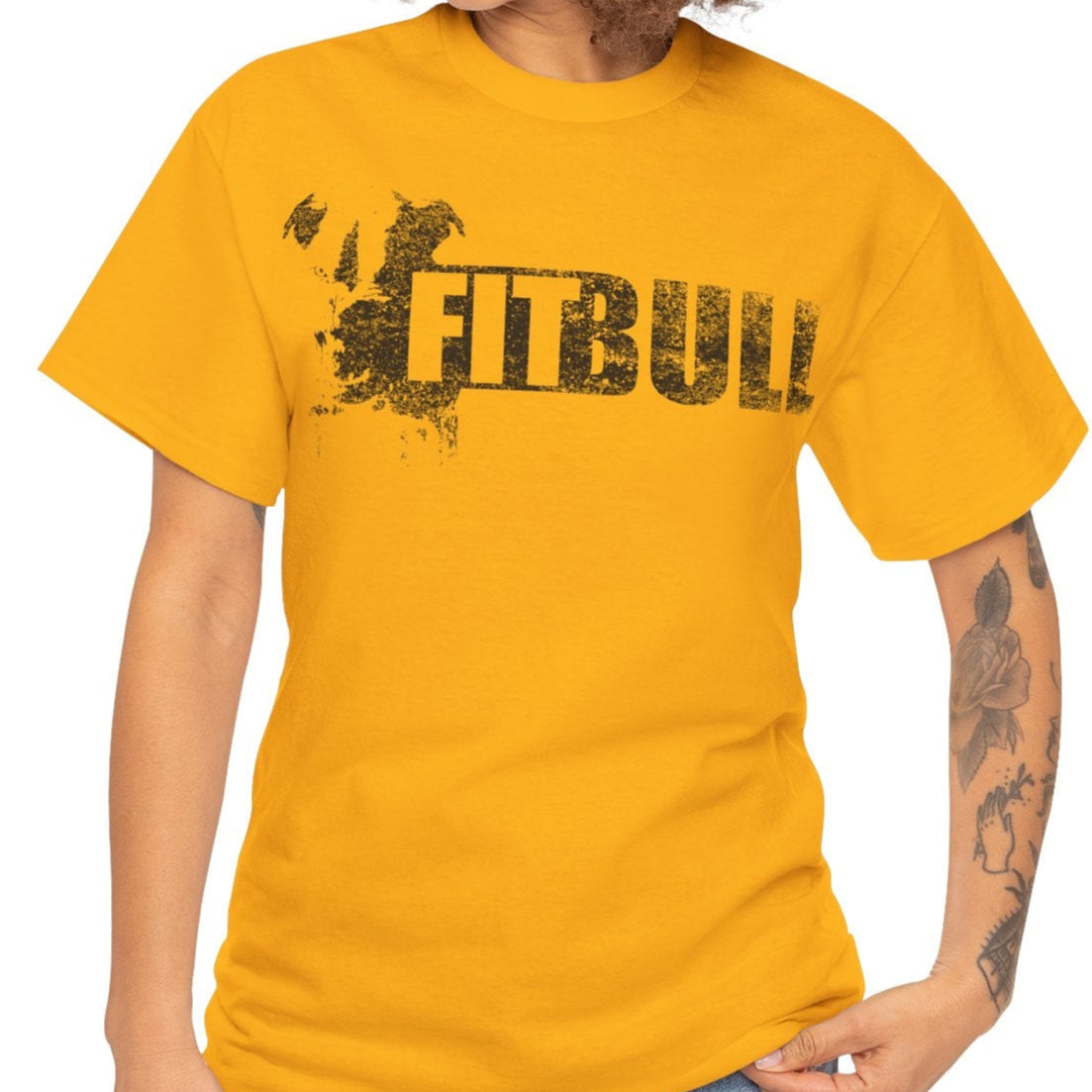 Woman wearing a yellow fitness t-shirt with 'Fitbull' training motivating.