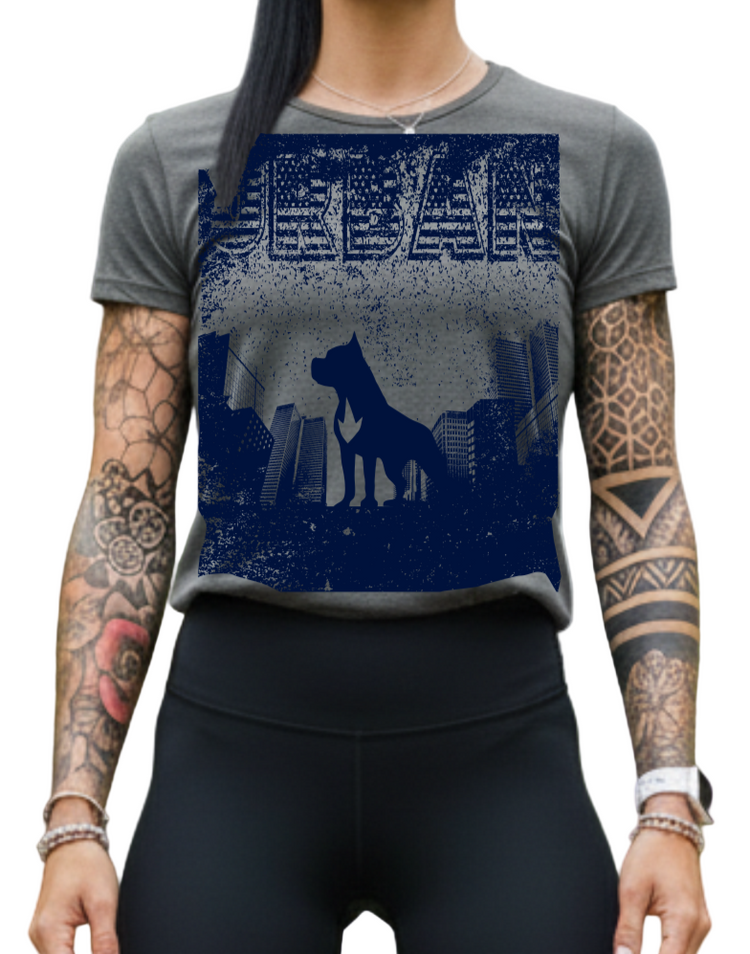 A woman wearing a grey Fitbull t-shirt with motivational Urban graphic design and black Fitbull leggings.
