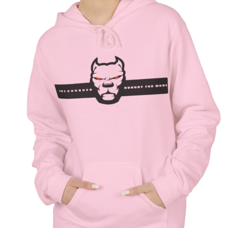 woman wearing pink sporty hoodie for fitness and bodybuilding training by the brand Fitbull, branded with a logo and a motivating motif front view