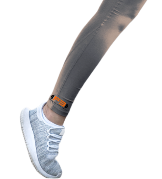 Person wearing gray athletic Fitbull leggings and sports bra.