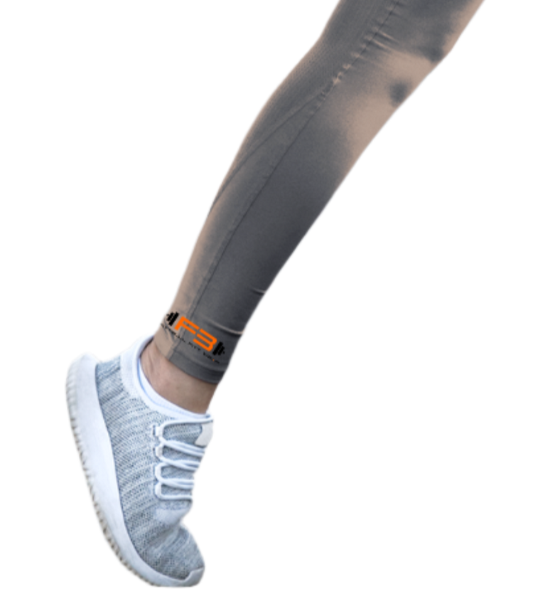 Person wearing gray athletic Fitbull leggings and sports bra.