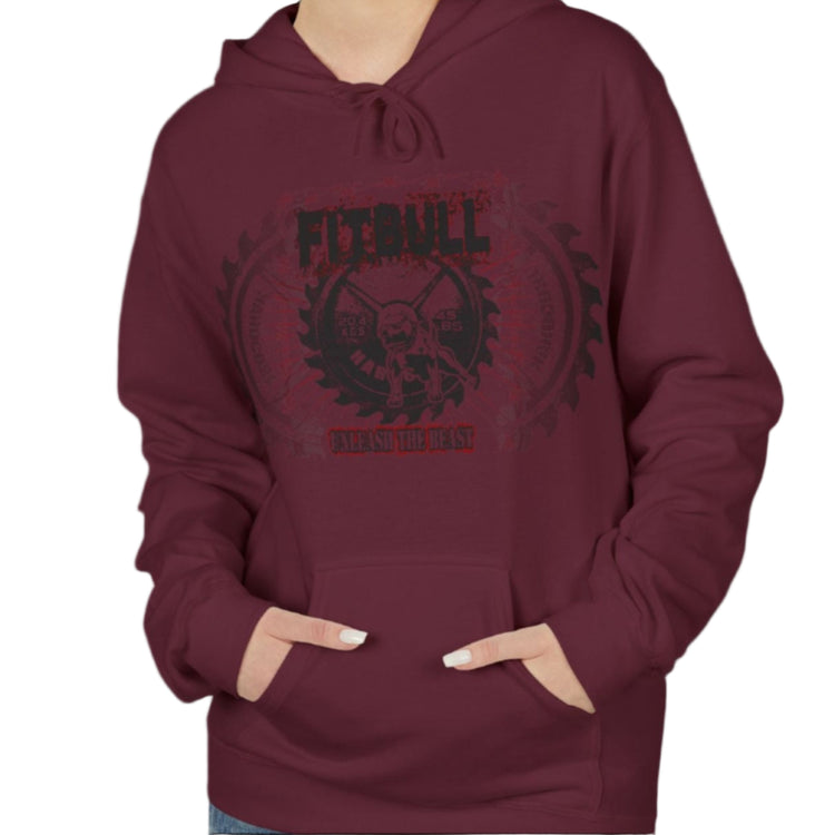 A woman wear sports rubin hoodet, fitness sweatshirt Fitbull, with motivation desighn Unleash The Beast.