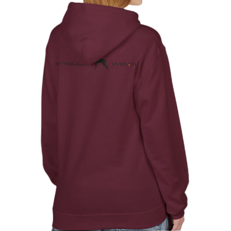 A woman wear sports rubin hoodet, fitness sweatshirt Fitbull, with motivation desighn Unleash The Beast, back view.