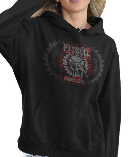 A woman wear sports black hoodet, fitness sweatshirt Fitbull, with motivation desighn Unleash The Beast.