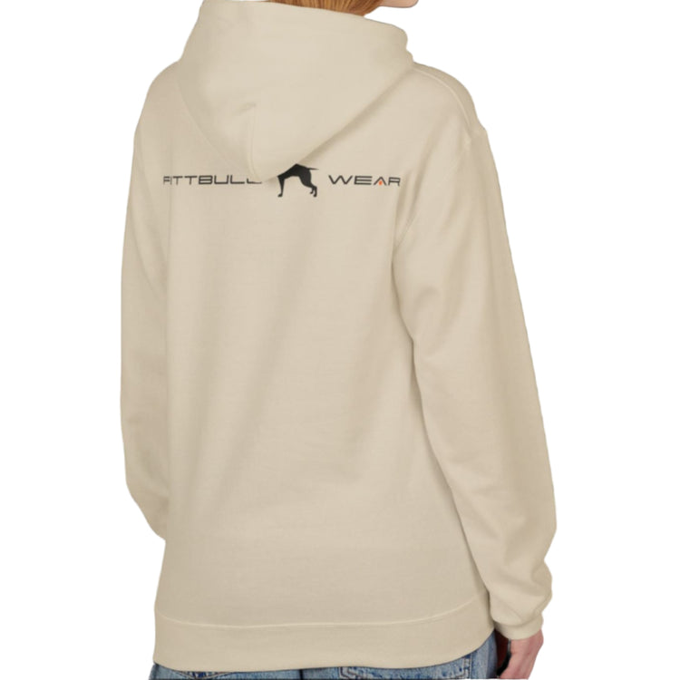 A woman wear sports beige hoodet, fitness sweatshirt Fitbull, with motivation desighn Unleash The Beast, back view.