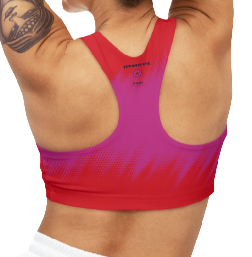 A women's athletic sports bra Gymstar, shown from the back. It features a red and purple color scheme with a dotted, gradient pattern radiating from the bottom. The straps are solid red and form a racerback style. The brand's logo, a red star within a circle of smaller stars, is printed on the upper back, along with the "GYMSTAR" brand name.