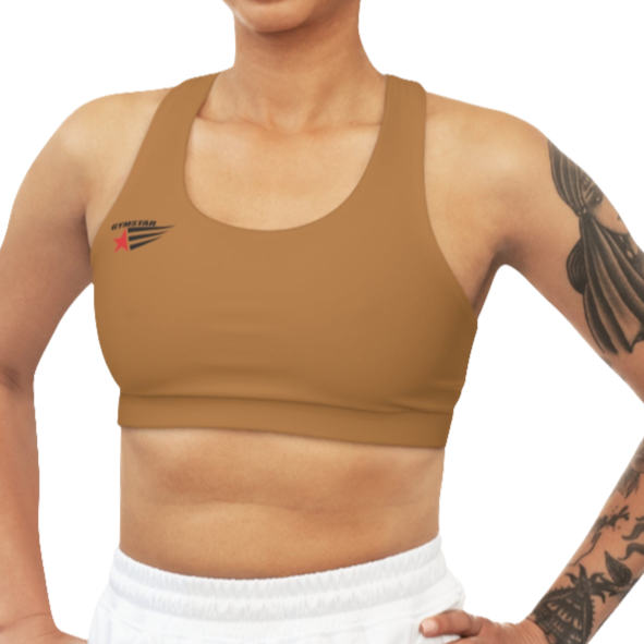 A women's solid brown athletic sports bra. It has a scoop neckline and a racerback fitness style. A small logo featuring a star and three red and blue stripes is on the left side of the chest, with the brand name "GYMSTAR" above it.