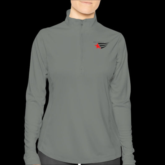 A person wearing a sport grey half-zip sweatshirt with logo printed on the front.