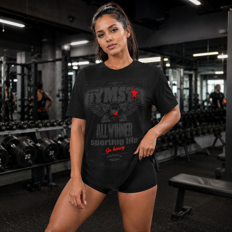 Woman wearing a black t-shirt with text GYMSTAR in a gym setting