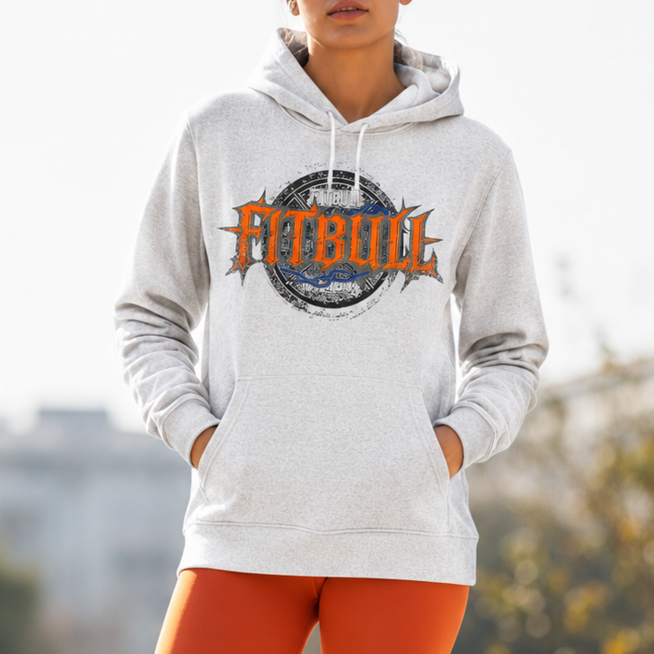 Person wearing a white hoodie with 'Fitbul' logo and orange leggings outdoors.