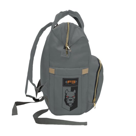 A gray FITBULL gym backpack with a logo that includes a stylized bull and the text 'FITBULL GYM', featuring multiple pockets and a padded shoulder strap design. Right side view.