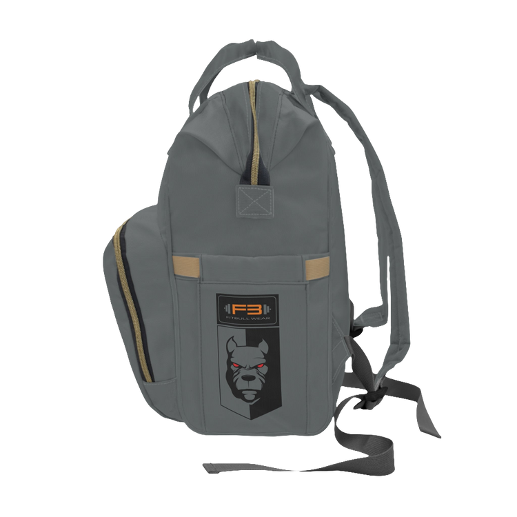 A gray FITBULL gym backpack with a logo that includes a stylized bull and the text 'FITBULL GYM', featuring multiple pockets and a padded shoulder strap design. Left side view.