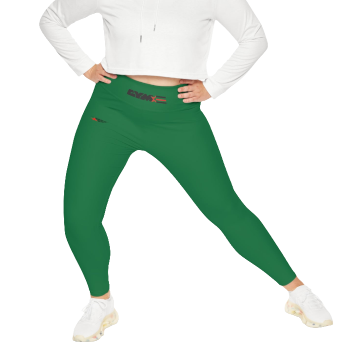 A woman wearing green high-waisted fitness leggings Gymstar with a logo on the waistband, paired with white sneakers. Action front view.