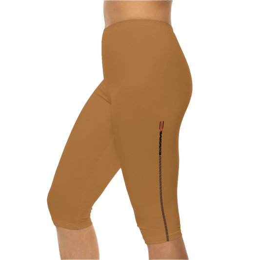 A woman wearing pair of brown Gymstar fitness leggings with a small logo on the left thigh area, designed for women. Left side close up view.