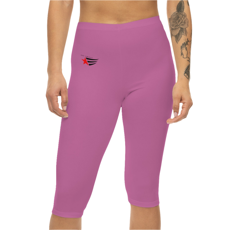 A woman wearing a pair of red-purple Gymstar fitness leggings with a small logo on the left thigh area, designed for women training and joga. Front close up view.
