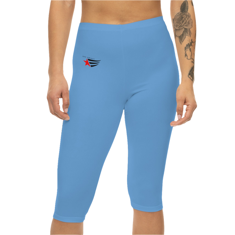 A woman wearing pair of blue fitness Gymstar leggings with a small logo on the upper left thigh area, designed for women's workouts. Front close up view.