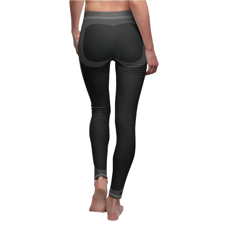 A female fitness model wearing pair of black Gymstar women's fitness leggings with capri cut, featuring white seam stitching and a mid-rise waist. Rear close up view.