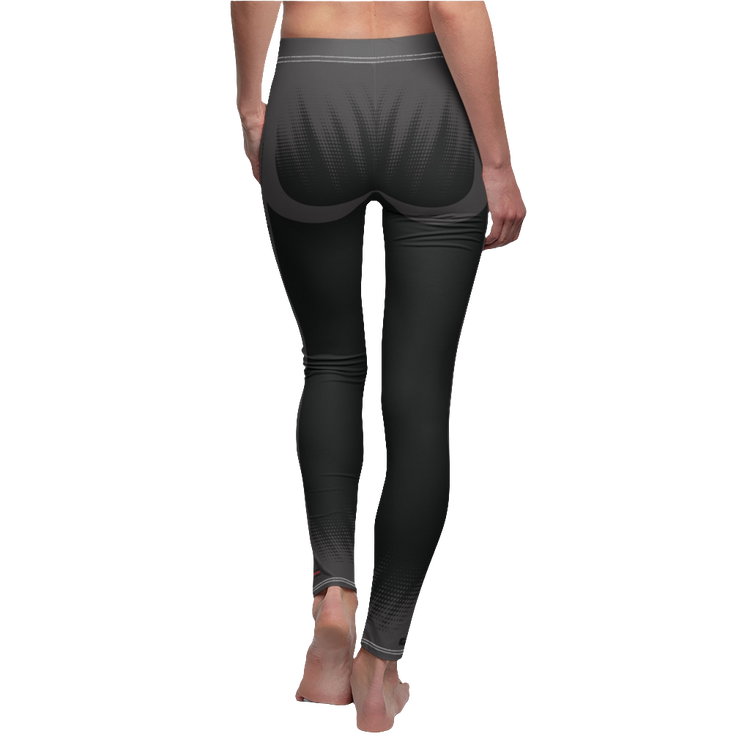 A female fitness model wearing pair of black Gymstar women's fitness leggings with capri cut, featuring white seam stitching and a mid-rise waist and art design.  Rear close up view.