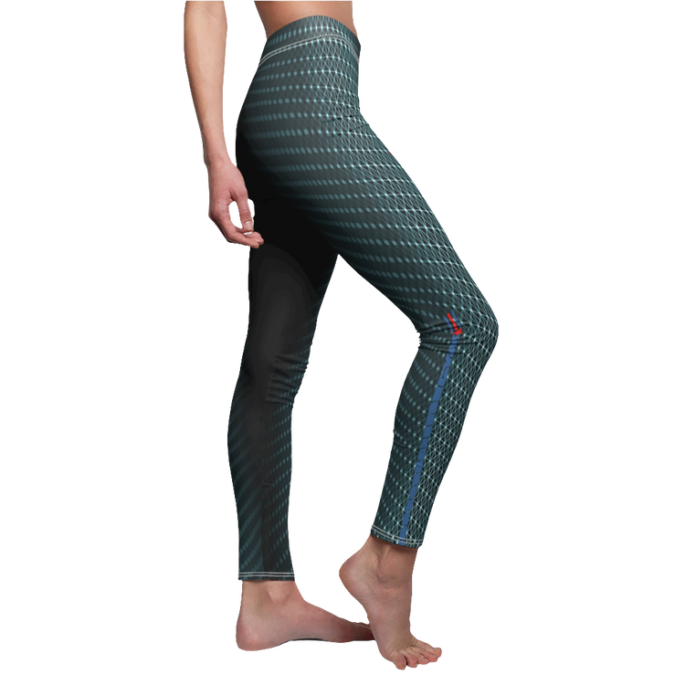 A female fitness model wearing pair of women's fitness leggings with a geometric cut and sew pattern, predominantly in green with black accents, designed for yoga and crossfit. Right side view.