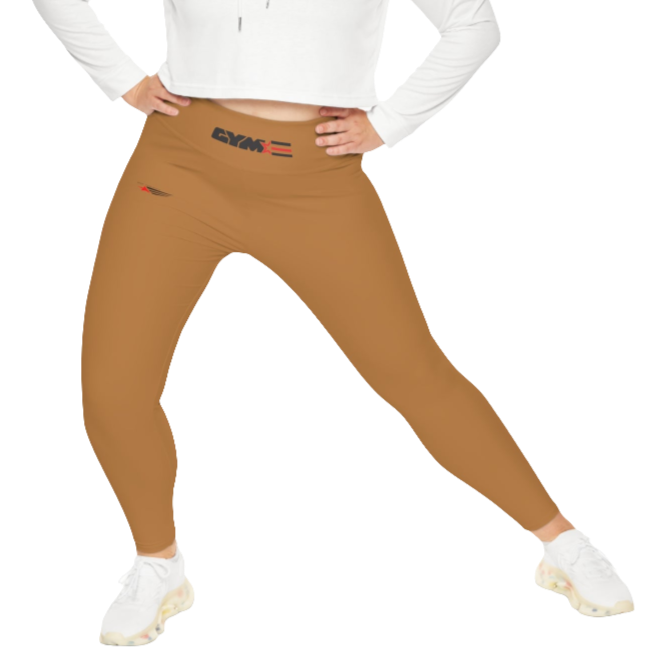 A woman wearing pair of brown high-waisted Gymstar fitness leggings with a logo on the upper left thigh, paired with white sneakers. Front action view.
