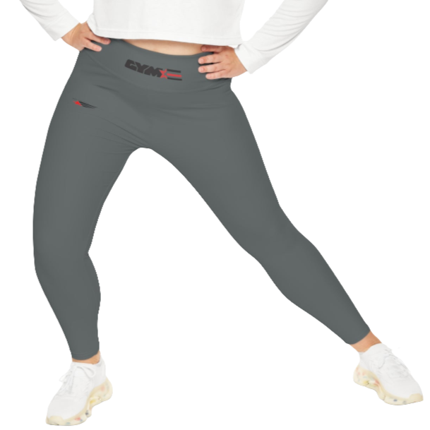 A woman wearing pair of grey high-waisted Gymstar fitness leggings with a logo on the upper left thigh, paired with white sneakers. Front action view.