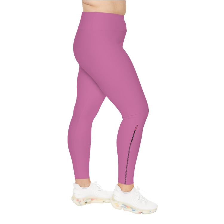 A woman wearing pair of purple high-waisted fitness leggings with a Gymstar logo on the upper left thigh, paired with white sneakers. Right side view.
