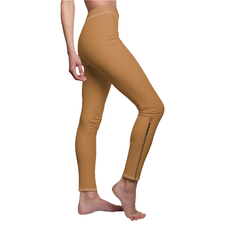 A woman wearing pair of beige, skinny fit Gymstar women's  fitness leggings designed for activewear. Left view.