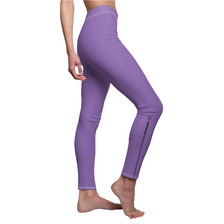 A woman wearing pair of purple Gymstar women's leggings featuring a high waist and thin design, suitable for activewear. Left side view.