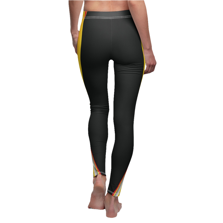A pair of black Gymstar yoga leggings for fitness, with a colorful stripe design on the side, featuring a high waist cut. Back side view.
