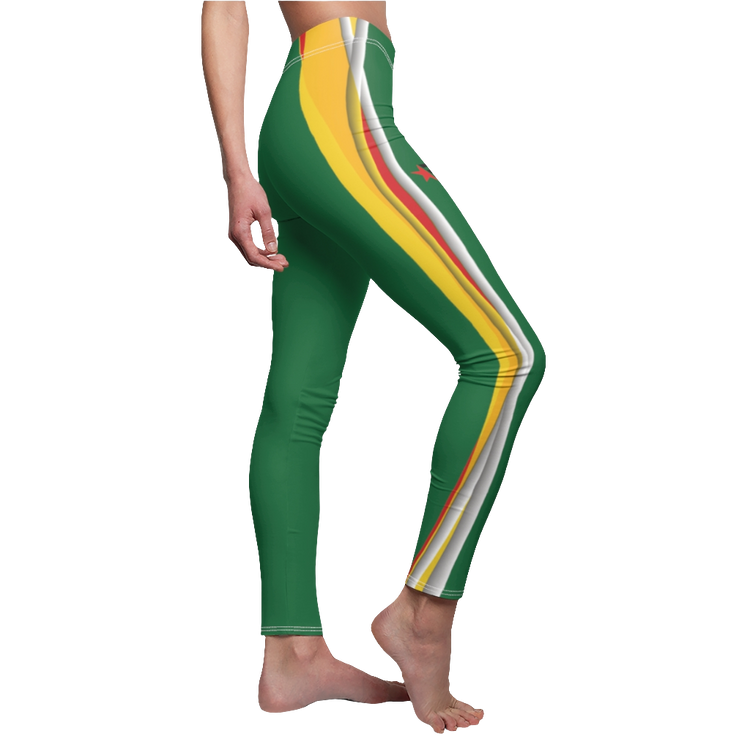 A woman wearing pair of green sports Gymstar leggings with a yellow and red stripe, designed for fitness and active wear. Left side view.