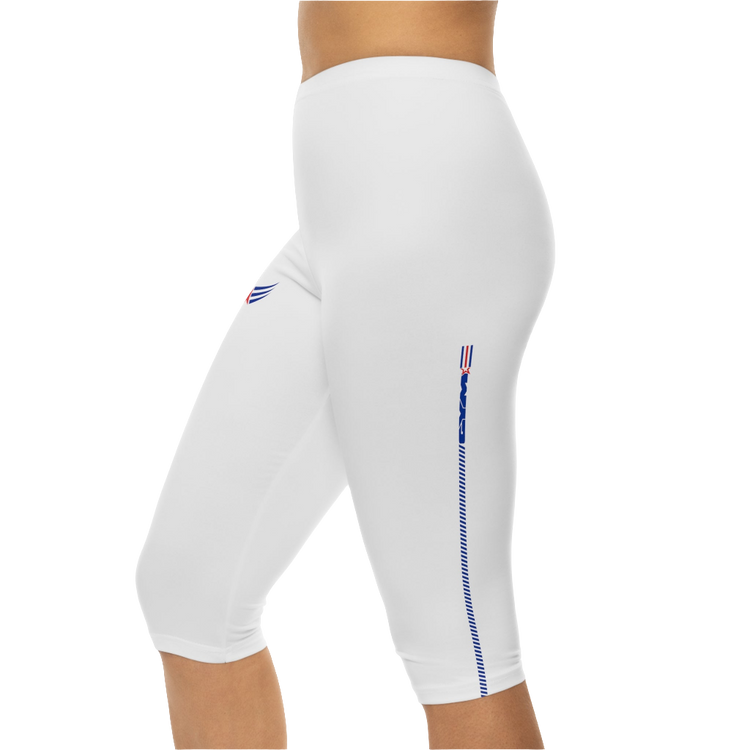 A pair of white Gymstar fitness capri leggings with blue and red detailing on the side, worn by a model facing sideways.