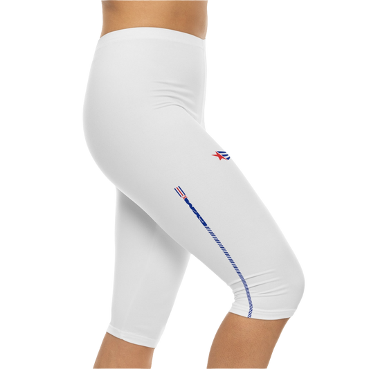 A pair of white Gymstar fitness capri leggings with blue and red detailing on the side, worn by a model, left side view.