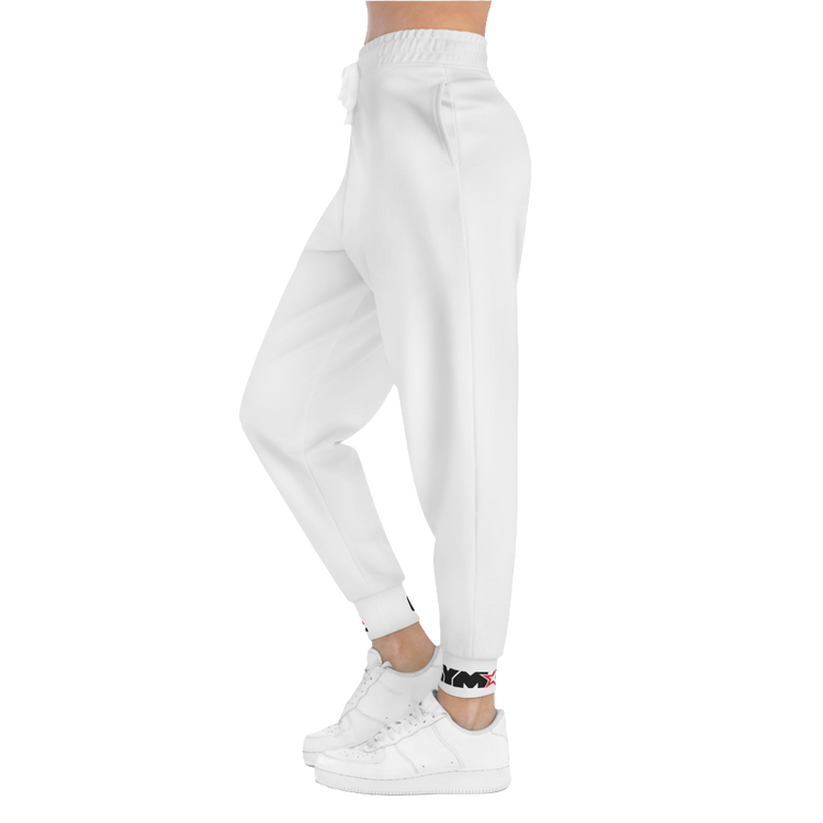 A person standing sideways, wearing silver gray joggers Gymstar with a logoand white sneakers. The joggers have a ribbed bottom and waistband cuffs, and feature two side pockets.