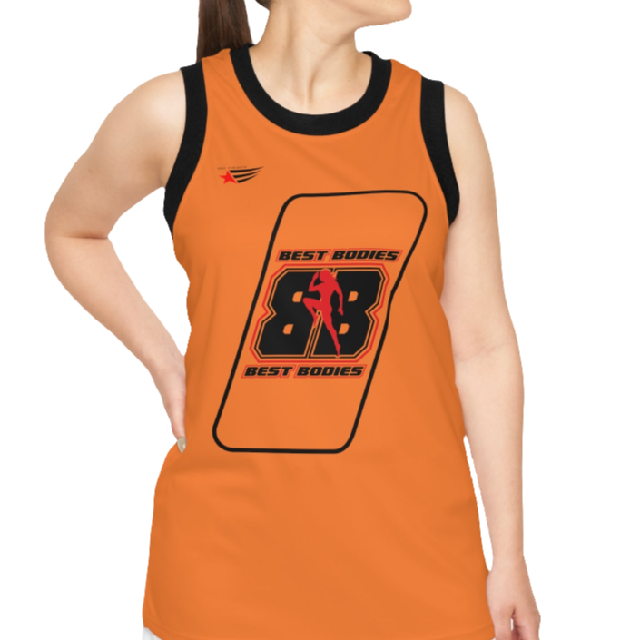 A woman with a fitness body is wearing an orange Gymstar sports tank top branded with the Gymstar Fit logo and a motivating print.
