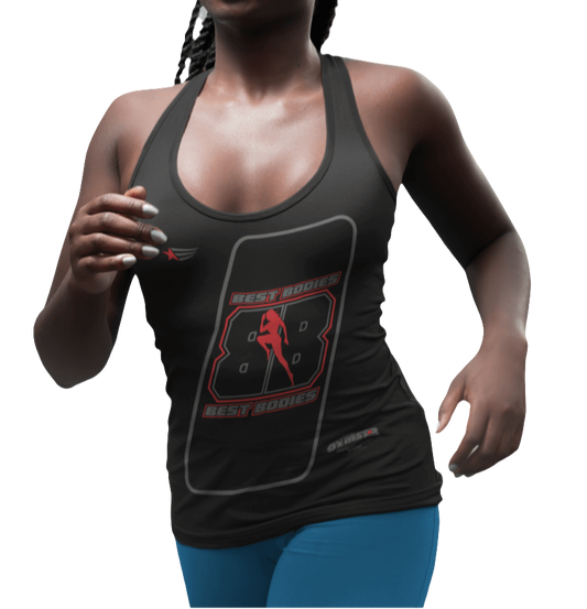 A woman with a fitness body is wearing a black Gymstar sports tank top branded with the Gymstar Fit logo and a motivating print.
