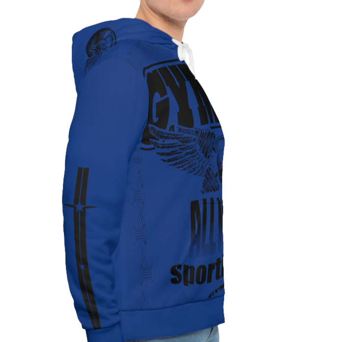 A man wearing a blue hoodie with 'GYMSRTA' and related graphics printed on the front, including a star and the text 'ALL WINNERS'. He has a casual and confident expression right cide view.