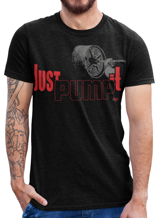А man wearing sporty, black cotton Gymstar fitness t-shirt Just Pump It with a motivating design of a hand holding a barbell. Close-up front view.